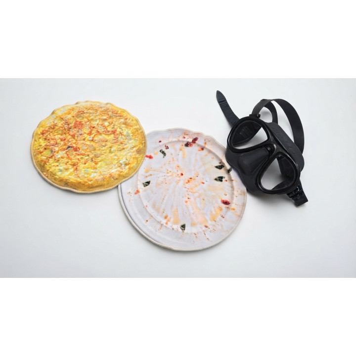 Paño de gamuza con forma de tortilla.